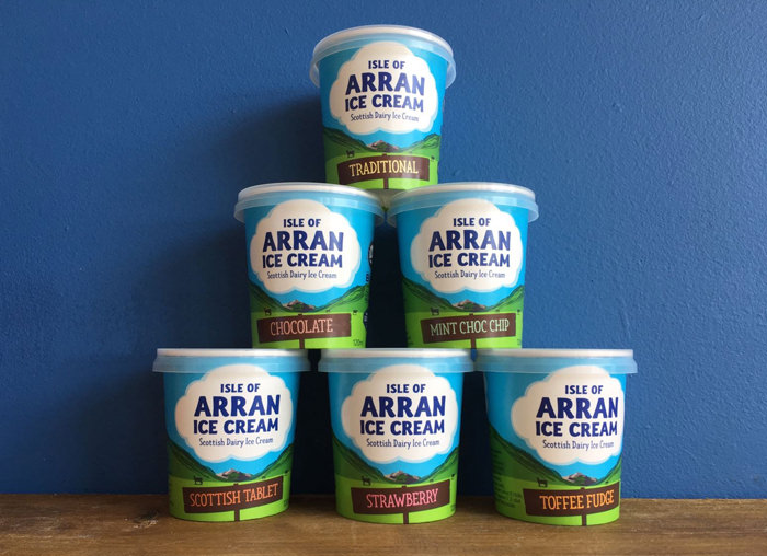 A stack of Arran Ice Cream tubs