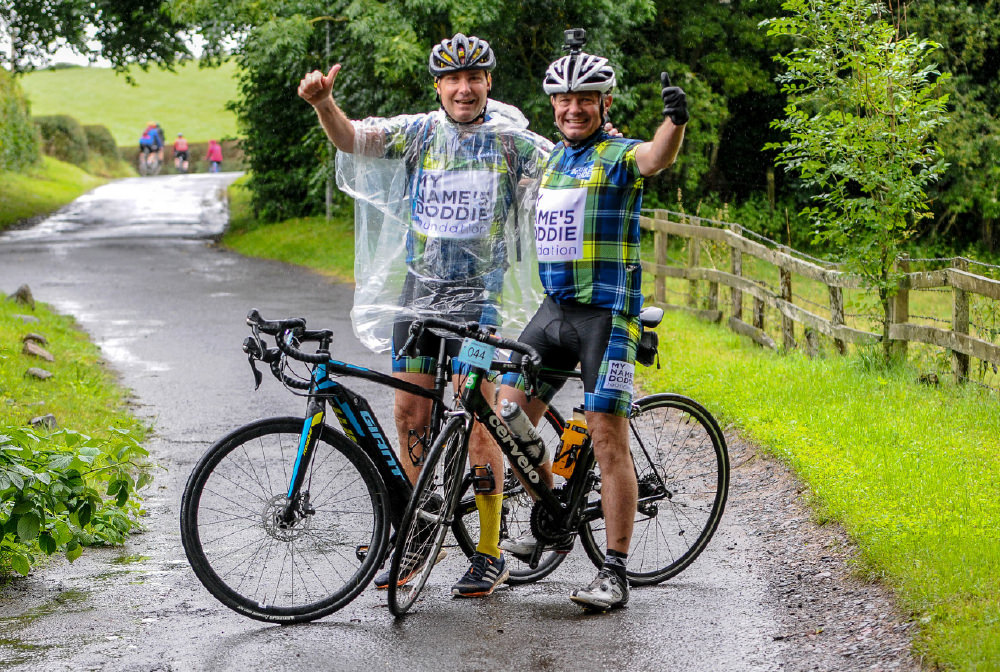 Doddie'5 Ride cyclists in the rain
