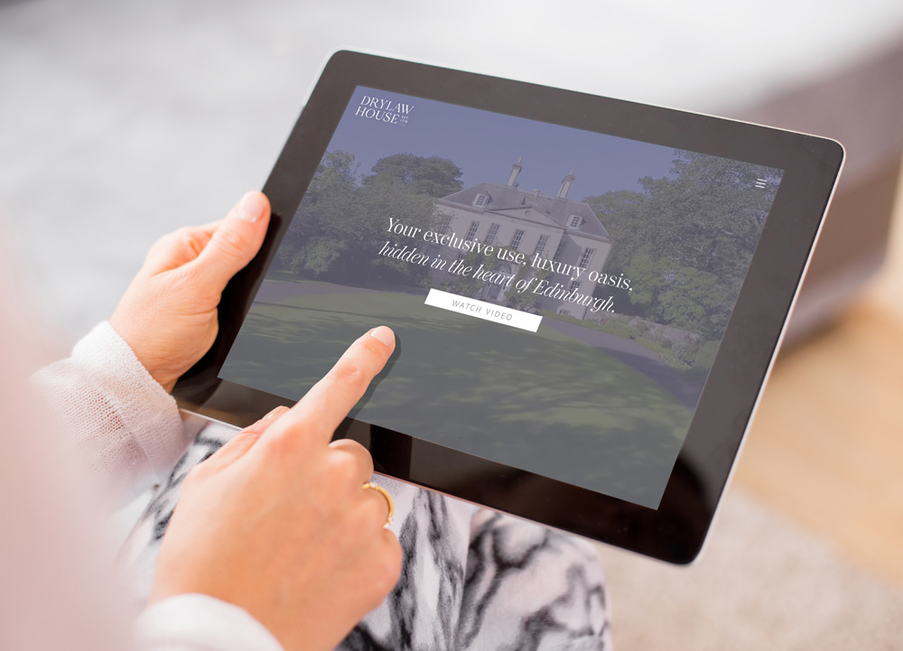 The Drylaw House website shown on an iPad