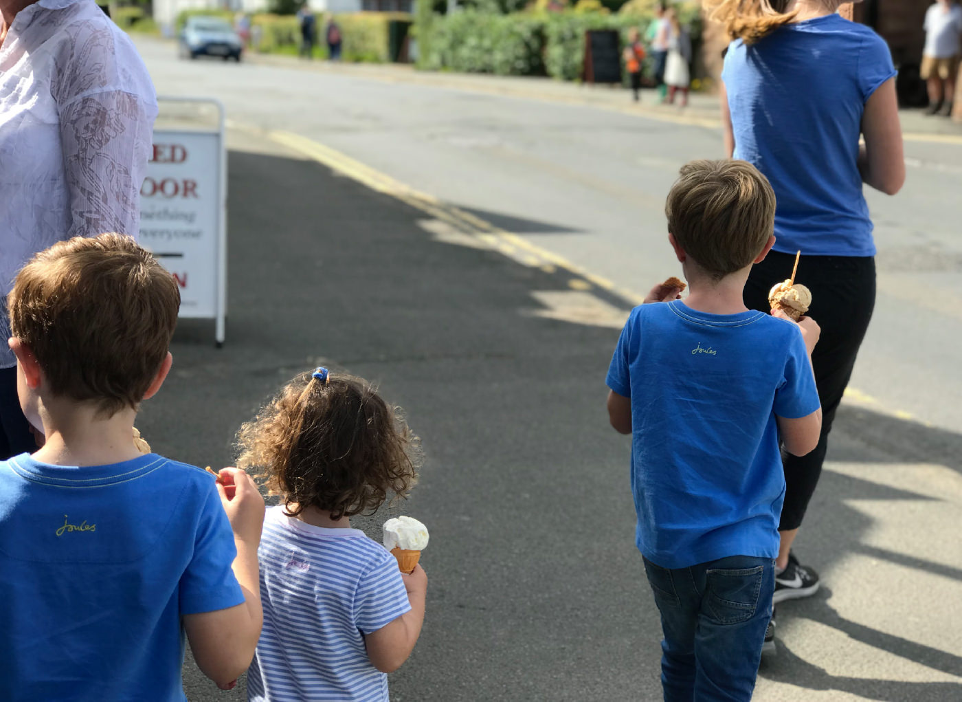 Children leaving The Parlour with ice creams